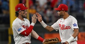 Jun 30, 2026; Philadelphia, Pennsylvania, USA; Philadelphia Phillies first baseman Bryce Harper (3) and center fielder Justin Crawford (2) celebrate win against the Pittsburgh Pirates at Citizens Bank Park.