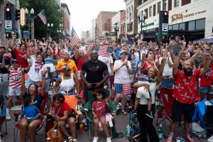 World Cup fans erupt in cheers at the start of the U.S.-Belgium match during an outdoor watch party on Gay Street on July 6, 2026, in Knoxville, Tennessee. The event was hosted by One Knox SC and the City of Knoxville.