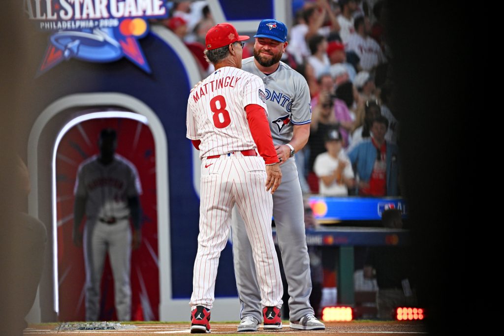 Jul 14, 2026; Philadelphia, Pennsylvania, USA; Philadelphia Phillies manager Don Mattingly and Toronto Blue Jays manager John Schneider embrace before the All-Star Game at Citizens Bank Park.