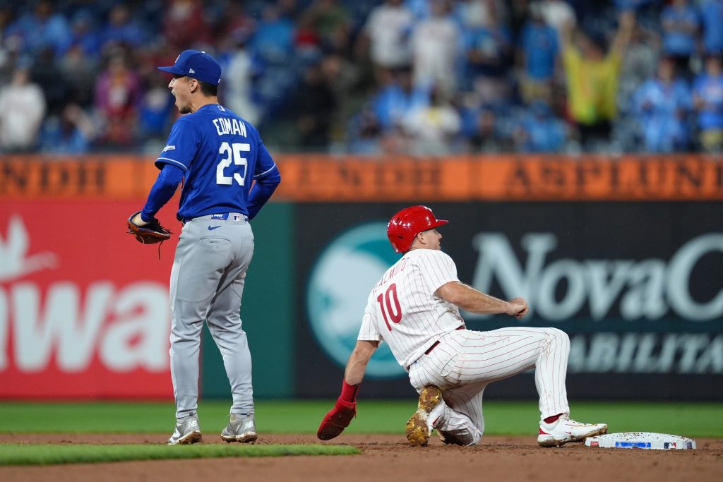 Jul 21, 2026; Philadelphia, Pennsylvania, USA; Los Angeles Dodgers infielder Tommy Edman (25) reacts after tagging out Philadelphia Phillies catcher JT Realmuto (10) in the ninth inning at Citizens Bank Park.