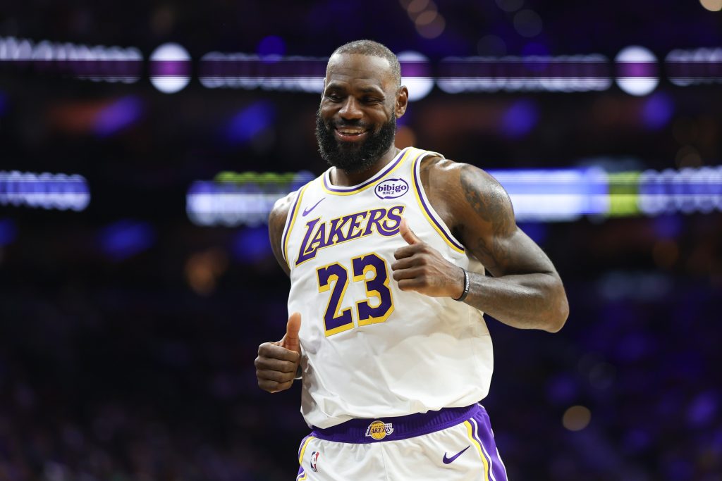 Dec 7, 2025; Philadelphia, Pennsylvania, USA; Los Angeles Lakers forward Lebron James (23) reacts after a play against the Philadelphia 76ers during the second quarter at Xfinity Mobile Arena.