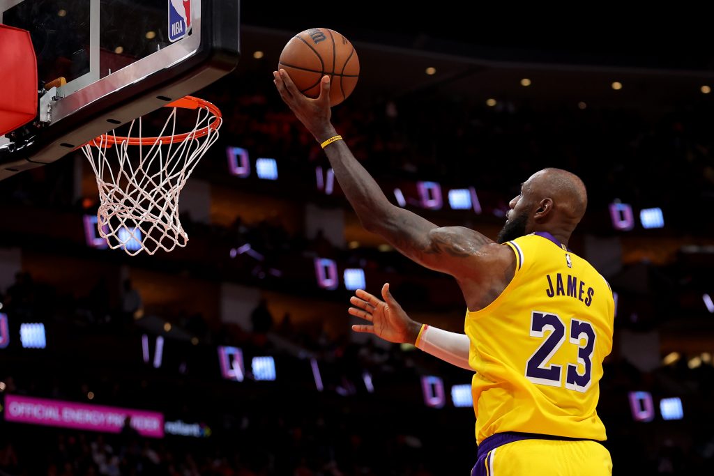 May 1, 2026; Houston, Texas, USA; Los Angeles Lakers forward Lebron James (23) makes a layup against the Houston Rockets during the fourth quarter of game six of the first round of the 2026 NBA Playoffs at Toyota Center.