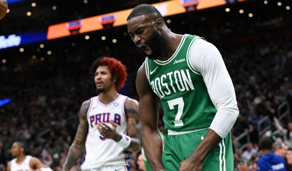 Apr 21, 2026; Boston, Massachusetts, USA; Boston Celtics guard Jaylen Brown (7) reacts after being folded by Philadelphia 76ers guard Kelly Oubre Jr. (9) in the second half of a game two of the first round of the 2026 NBA Playoffs at TD Garden.