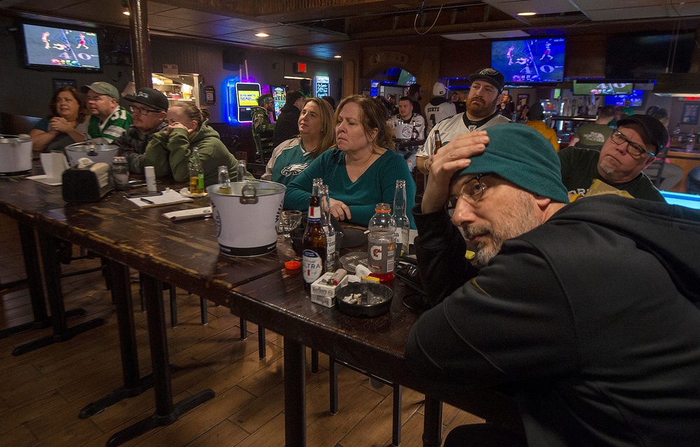 Fans watch the Philadelphia Eagles play the Kanas City Chiefs in Super Bowl LVII, in Arizona, on Sunday, Feb. 12, 2023, at Five Points Sports Bar in Levittown.