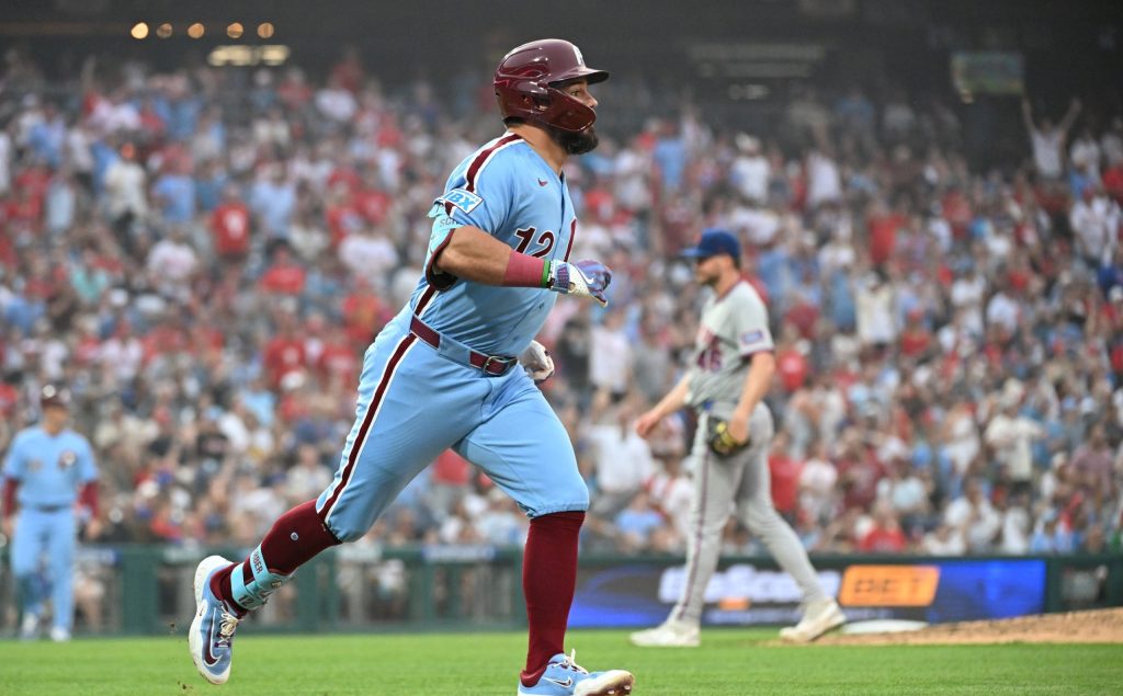 Jul 16, 2026; Philadelphia, Pennsylvania, USA; Philadelphia Phillies designated hitter Kyle Schwarber (12) watches his double during the sixth inning against the New York Mets at Citizens Bank Park.