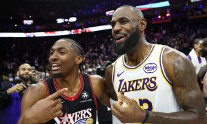 Dec 7, 2025; Philadelphia, Pennsylvania, USA; Los Angeles Lakers forward Lebron James (23) and Philadelphia 76ers guard Tyrese Maxey react with each other after the game at Xfinity Mobile Arena.