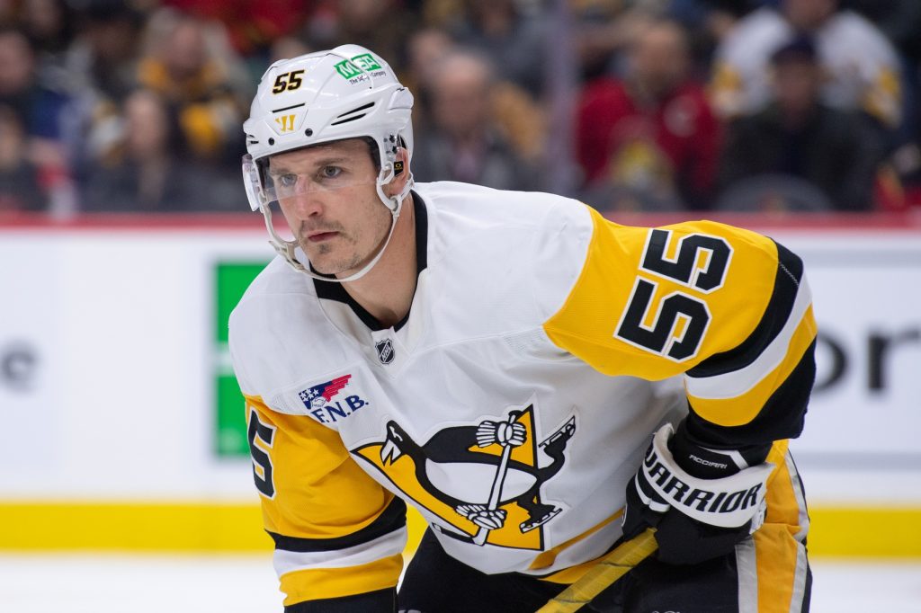 Mar 26, 2026; Ottawa, Ontario, CAN; Pittsburgh Penguins center Noel Acciari (55) gets in position for a face-off in the first period against the Ottawa Senators at the Canadian Tire Centre.