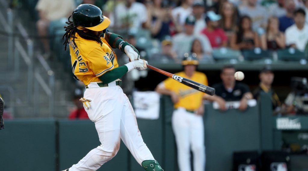 Jul 18, 2026; West Sacramento, California, USA; Athletics third baseman Joshua Kuroda-Grauer (44) hits a RBI single against the Washington Nationals during the second inning at Sutter Health Park.
