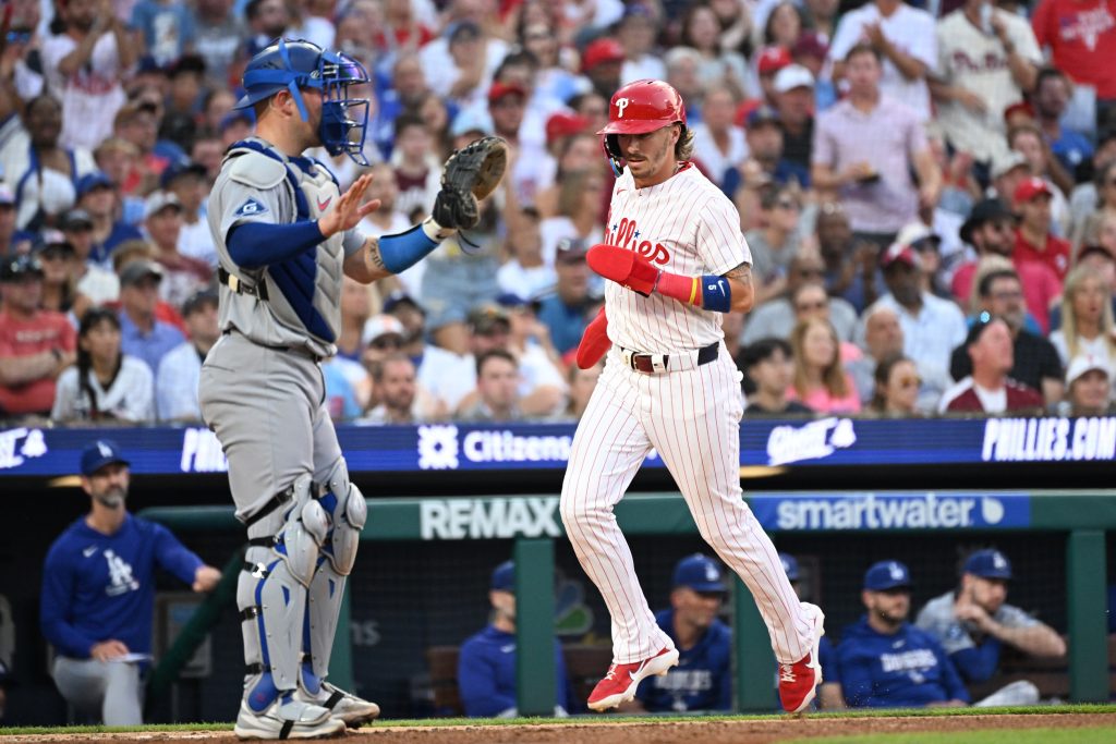 Jul 20, 2026; Philadelphia, Pennsylvania, USA; Philadelphia Phillies second baseman Bryson Stott (5) scores a run against Los Angeles Dodgers catcher Dalton Rushing (68) during the second inning at Citizens Bank Park.