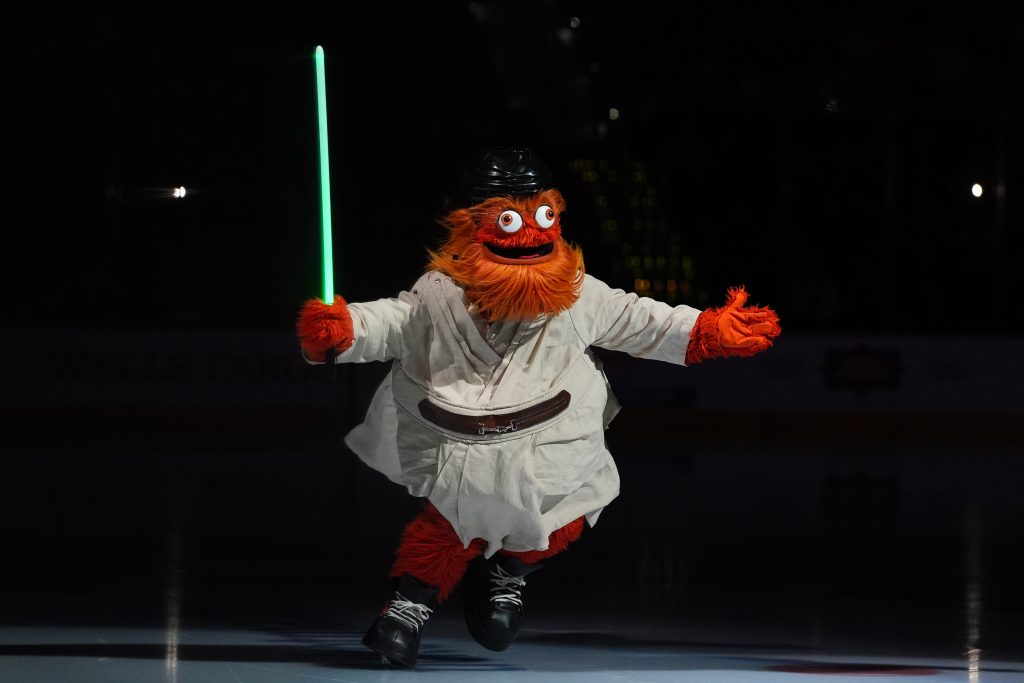 Nov 16, 2024; Philadelphia, Pennsylvania, USA; Philadelphia Flyers mascot Gritty entertains fans in a Star Wars costume before the game against the Buffalo Sabres at Wells Fargo Center.