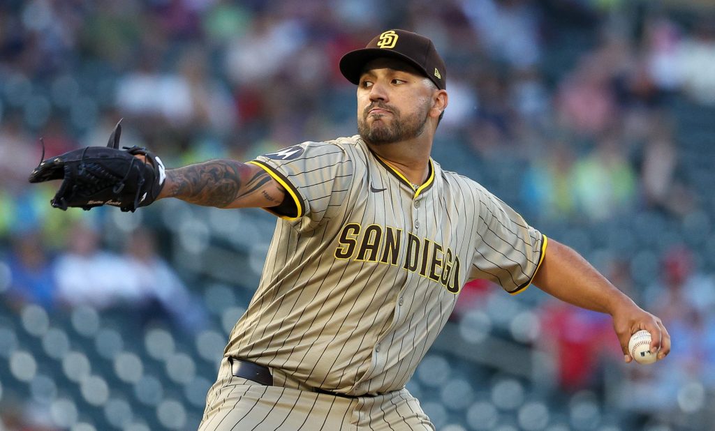 Aug 29, 2025; Minneapolis, Minnesota, USA; San Diego Padres starting pitcher Nestor Cortes (65) delivers a pitch against the Minnesota Twins during the first inning at Target Field.