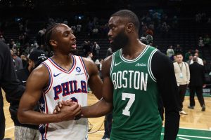 May 2, 2026; Boston, Massachusetts, USA; Philadelphia 76ers guard Tyrese Maxey (0) talks with Boston Celtics guard Jaylen Brown (7)after PhiladephiaÕs win in game seven of the first round of the 2026 NBA Playoffs at TD Garden.