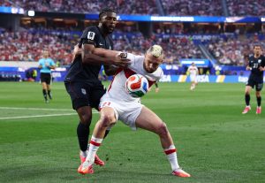 Soccer Football - FIFA World Cup 2026 - Group D - Turkey v United States - Los Angeles Stadium, Inglewood, California, U.S. - June 25, 2026 Turkey's Baris Alper Yilmaz in action with Mark McKenzie of the