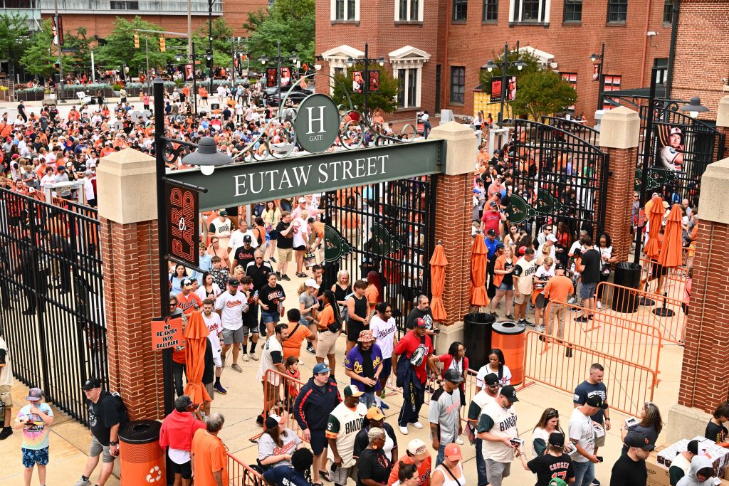 Jun 27, 2026; Baltimore, Maryland, USA; Fans enter the gates and stream onto Eutaw Street prior to the game between the Baltimore Orioles and the Washington Nationals at Oriole Park at Camden Yards.