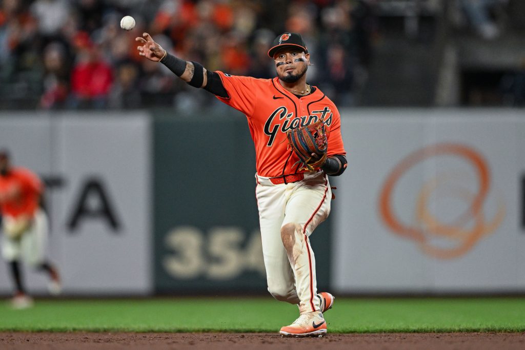 Jul 24, 2026; San Francisco, California, USA; San Francisco Giants second baseman Luis Arraez (1) throws the ball to first for an out in the top of the eighth inning against the Los Angeles Angels at Oracle Park.