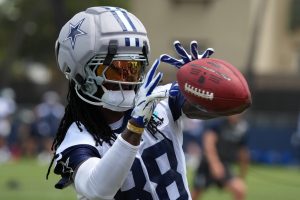 Jul 29, 2026; Oxnard, CA, USA; Dallas Cowboys receiver CeeDee Lamb (88) catches the ball wearing a Guardian helmet cap at training camp at River Ridge Playing Fields.