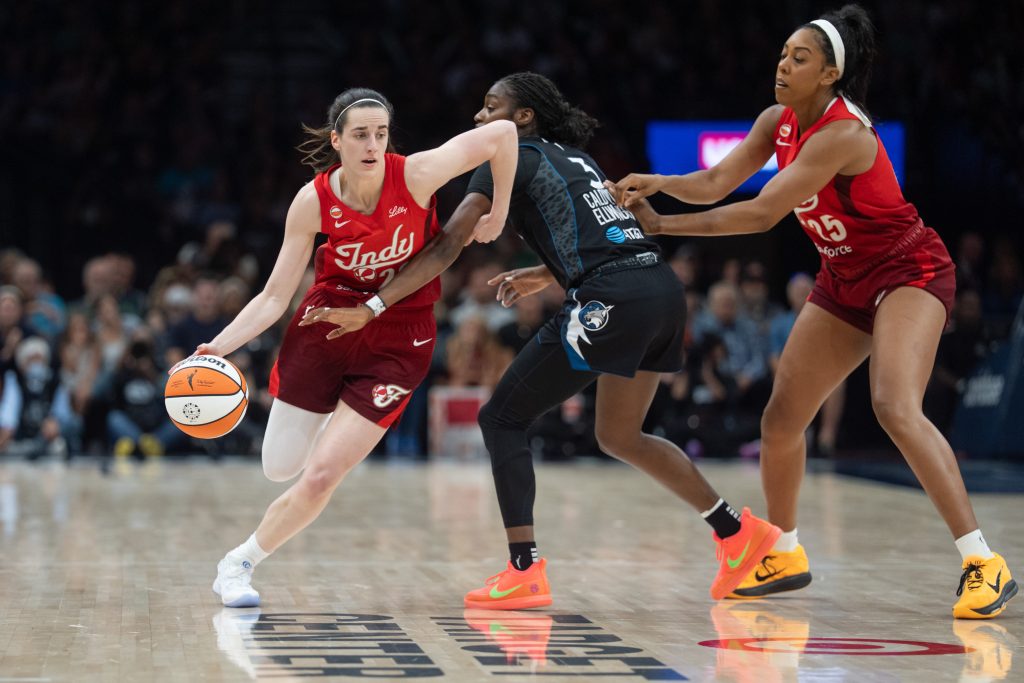 Aug 2, 2026; Minneapolis, Minnesota, USA; Minnesota Lynx guard Lani White (3) defends against Indiana Fever guard Caitlin Clark (22) in the fourth quarter at Target Center.