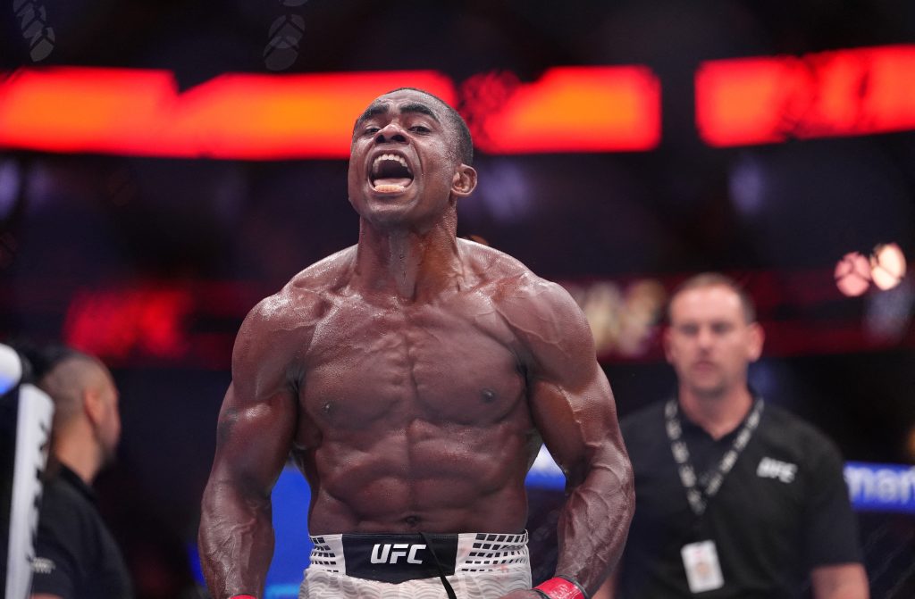 Aug 15, 2026; Philadelphia, Pennsylvania, USA; Jeremiah Wells (red gloves) reacts after defeating Myktybek Orolbai (blue gloves) during UFC 330 at Xfinity Mobile Arena. Mandatory Credit: