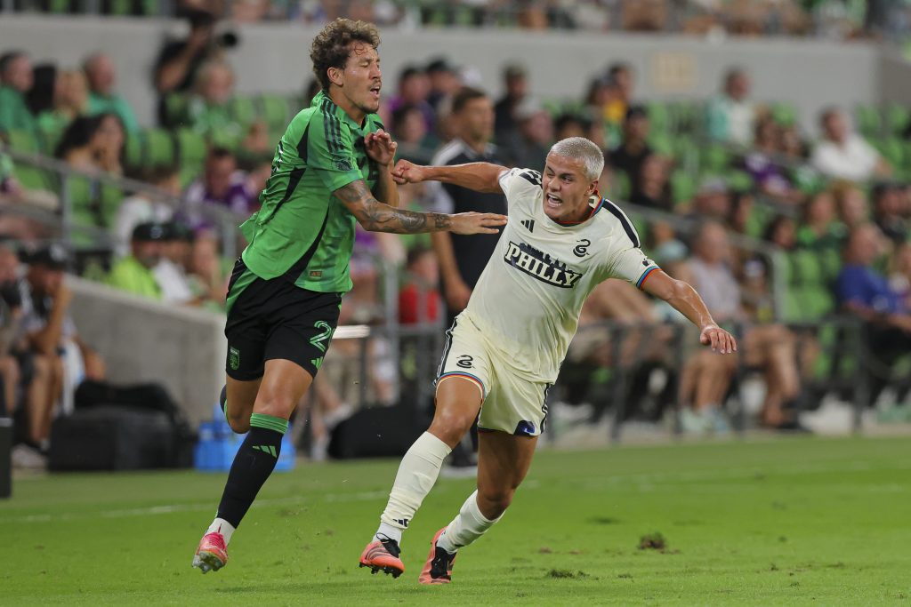 Aug 22, 2026; Austin, Texas, USA; Austin FC defender Guilherme Biro (29) vies for position against Philadelphia Union midfielder Cavan Sullivan (6) during the first half at Q2 Stadium.