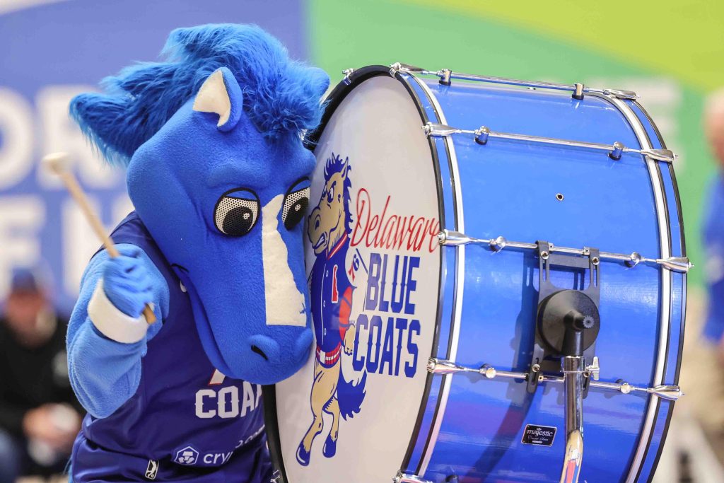 Coaty beats the drum during Game 2 of the NBA G league finals between the Delaware Blue Coats and the Rio Grande Valley Vipers in 2022.