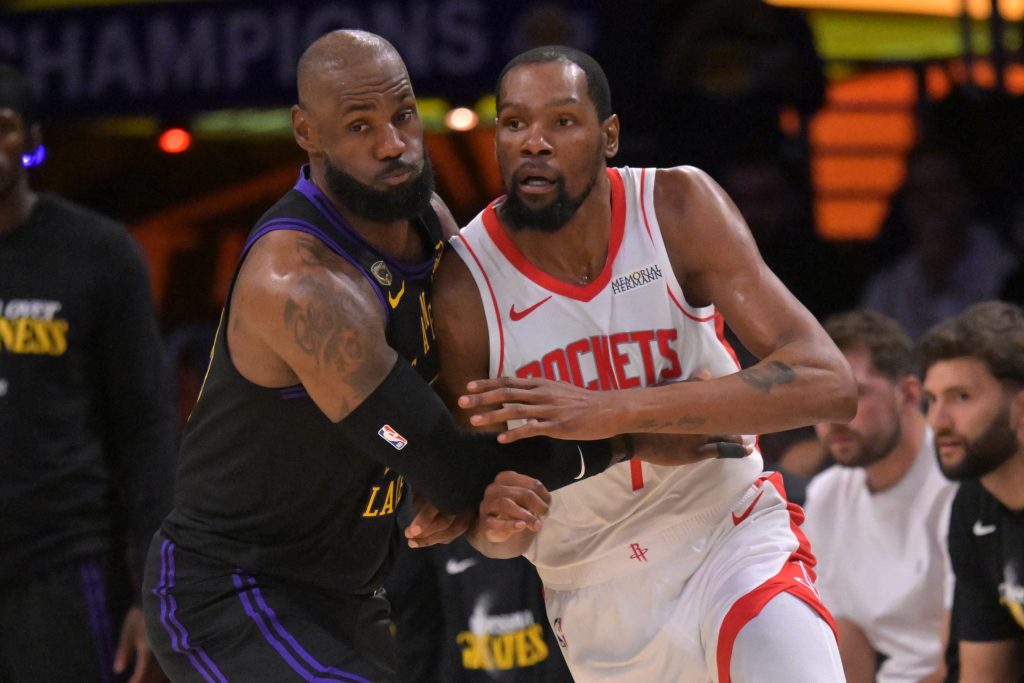 Apr 21, 2026; Los Angeles, California, USA; Los Angeles Lakers forward LeBron James (23) defends Houston Rockets forward Kevin Durant (7) in the first half of game two of the first round of the 2026 NBA Playoffs against the Houston Rockets at Crypto.com Arena.
