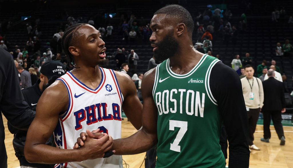 May 2, 2026; Boston, Massachusetts, USA; Philadelphia 76ers guard Tyrese Maxey (0) talks with Boston Celtics guard Jaylen Brown (7)after PhiladephiaÕs win in game seven of the first round of the 2026 NBA Playoffs at TD Garden.