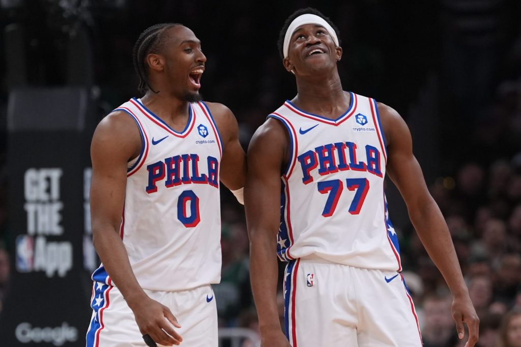 Apr 28, 2026; Boston, Massachusetts, USA; Philadelphia 76ers guard Tyrese Maxey (0) and guard Vj Edgecombe (77) on the court against the Boston Celtics in the second quarter during game five of the first round of the 2026 NBA Playoffs at TD Garden.