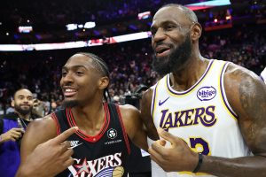 Dec 7, 2025; Philadelphia, Pennsylvania, USA; Los Angeles Lakers forward Lebron James (23) and Philadelphia 76ers guard Tyrese Maxey after the game at Xfinity Mobile Arena.