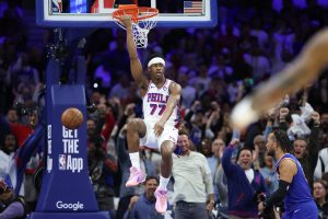 May 8, 2026; Philadelphia, Pennsylvania, USA; Philadelphia 76ers guard Vj Edgecombe (77) dunks the ball against the New York Knicks during the first quarter of game three of the second round of the 2026 NBA Playoffs at Xfinity Mobile Arena.