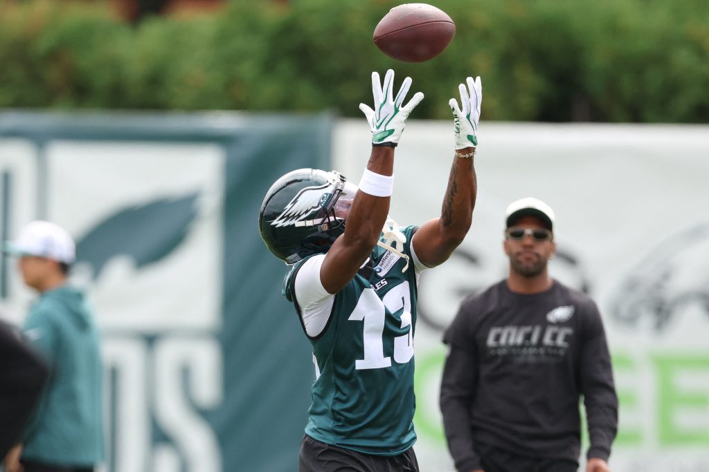 Jul 30, 2026; Philadelphia, PA, USA; Philadelphia Eagles wide receiver Dontayvion Wicks (13) reaches for a pass during training camp at Jefferson Health Training Complex.