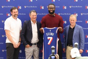 Aug 6, 2026; Camden, NJ, USA; From left to right Philadelphia 76ers general manager Mike Gansey and co managing partner David Blitzer and guard Jaylen Brown and managing partner Josh Harris pose for a photo during his introductory press conference at the Francis J. Myers Recreation Center.
