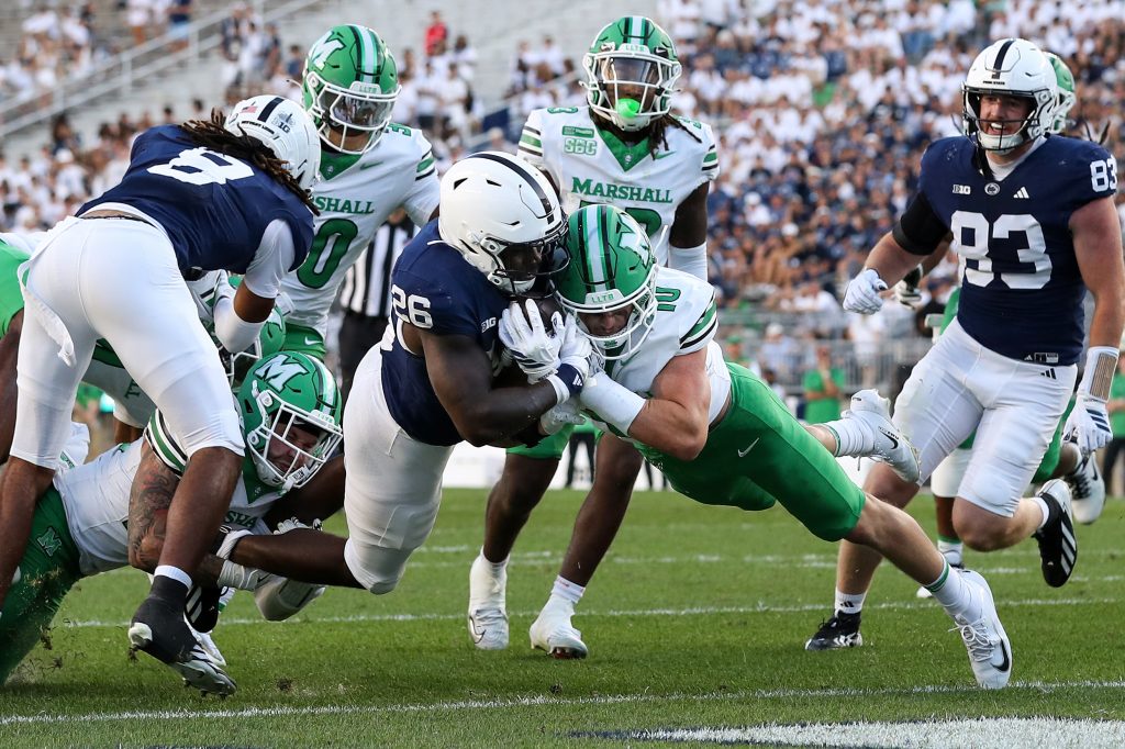 Sep 5, 2026; University Park, Pennsylvania, USA; Penn State Nittany Lions running back Cam Wallace (26) pushes forward into the end zone for a touchdown during the fourth quarter against the Marshall Thundering Herd at West Shore Home Field at Beaver Stadium.