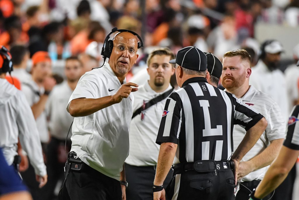 Sep 5, 2026; Blacksburg, Virginia, USA; Virginia Tech Hokies head coach James Franklin has a conversation with officials during the third quarter against the VMI Keydets at Lane Stadium.
