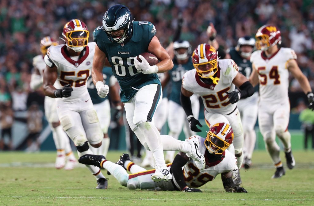 Sep 13, 2026; Philadelphia, Pennsylvania, USA; Philadelphia Eagles tight end Dallas Goedert (88) runs after a catch for a touchdown past Washington Commanders safety Jeremy Reaves (39) during the second half at Lincoln Financial Field.