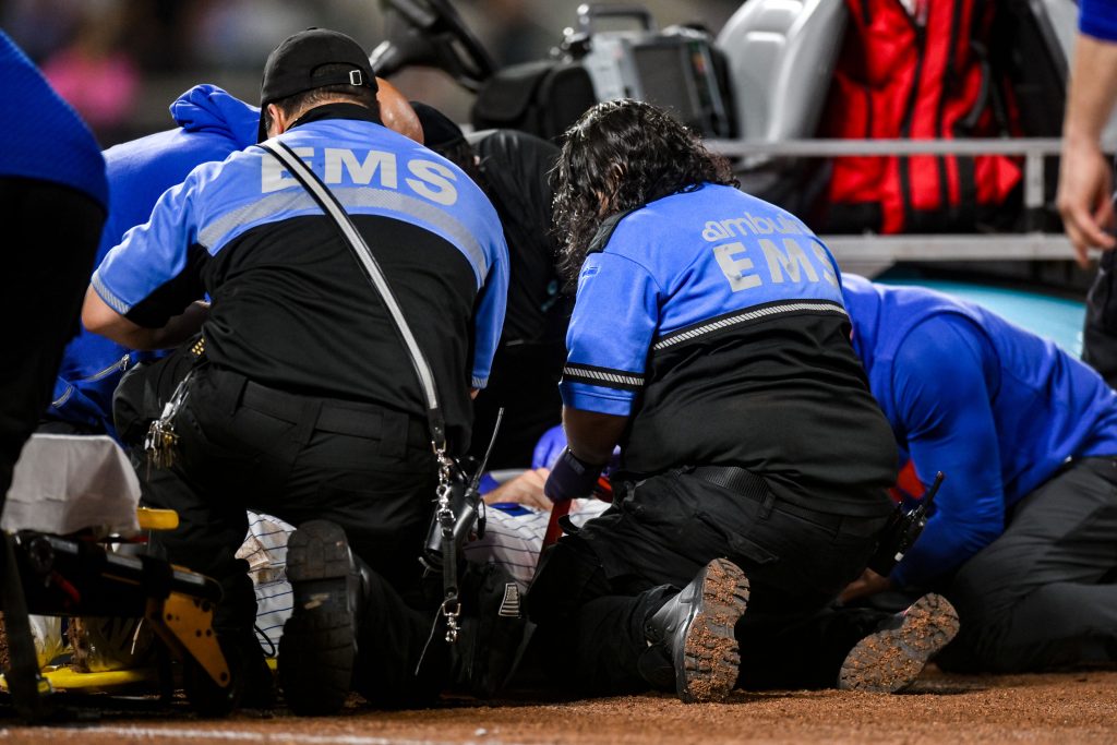 Sep 17, 2026; New York City, New York, USA; New York Mets first baseman Jared Young (29) receives medical attention after an injury at first base during the sixth inning against the Philadelphia Phillies at Citi Field.