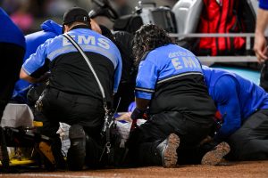 Sep 17, 2026; New York City, New York, USA; New York Mets first baseman Jared Young (29) receives medical attention after an injury at first base during the sixth inning against the Philadelphia Phillies at Citi Field.