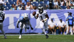 Sep 20, 2026; Nashville, Tennessee, USA; Philadelphia Eagles quarterback Jalen Hurts (1) scrambles during the third quarter at Nissan Stadium.