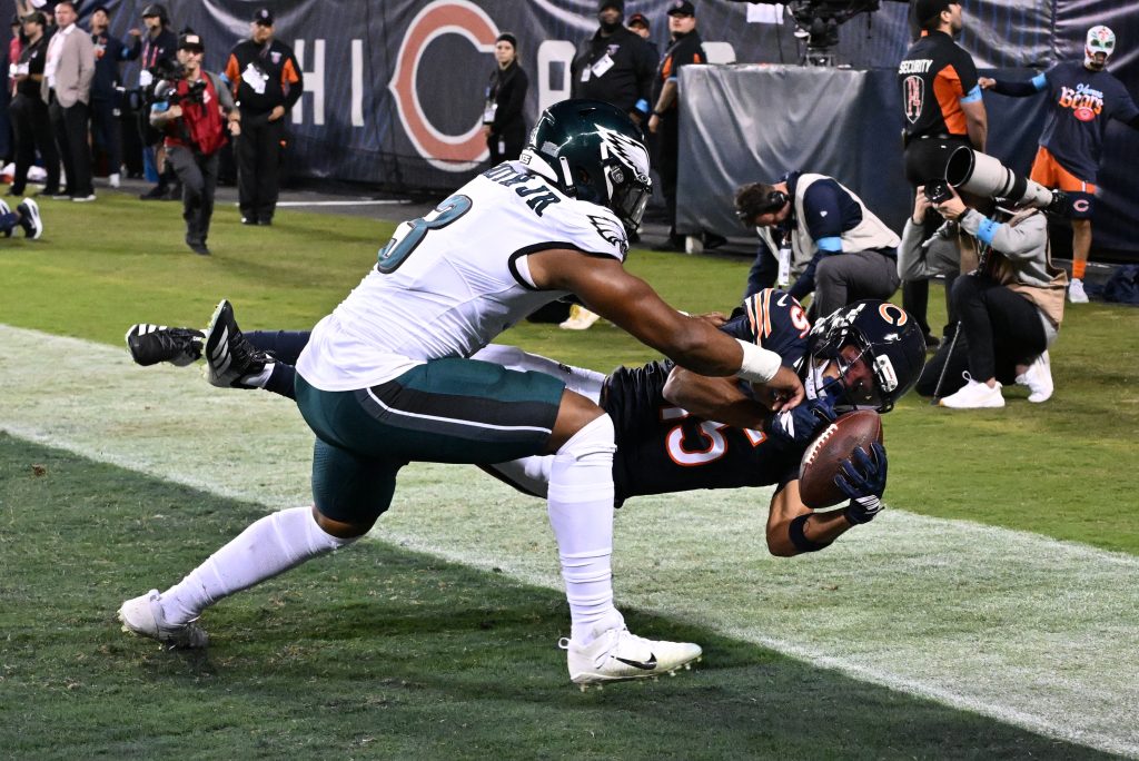Sep 28, 2026; Chicago, Illinois, USA; Chicago Bears wide receiver Rome Odunze (15) cannot make a catch against Philadelphia Eagles linebacker Nolan Smith Jr. (3) during the first half at Soldier Field.