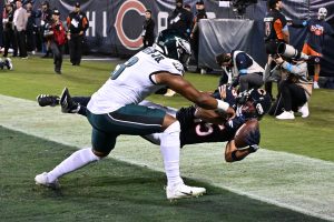 Sep 28, 2026; Chicago, Illinois, USA; Chicago Bears wide receiver Rome Odunze (15) cannot make a catch against Philadelphia Eagles linebacker Nolan Smith Jr. (3) during the first half at Soldier Field.