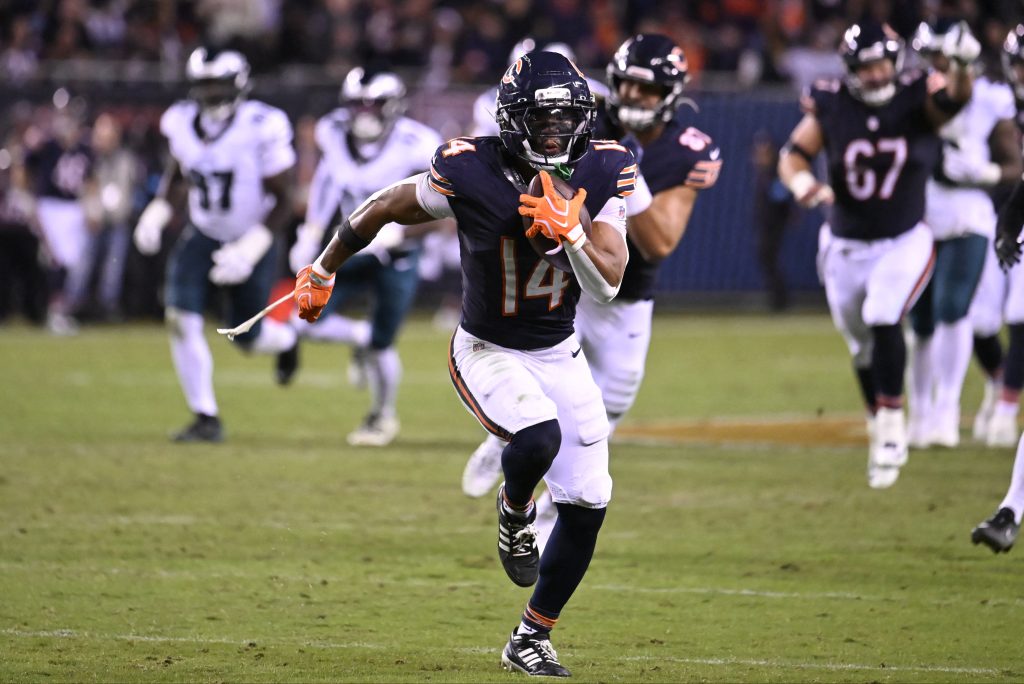 Sep 28, 2026; Chicago, Illinois, USA; Chicago Bears wide receiver Kalif Raymond (14) runs to score a touchdown against the Philadelphia Eagles during the second halfat Soldier Field.