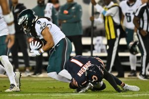 Sep 28, 2026; Chicago, Illinois, USA; Chicago Bears defensive back Jaylon Johnson (1) tackles Philadelphia Eagles wide receiver Makai Lemon (9) during the second half at Soldier Field.
