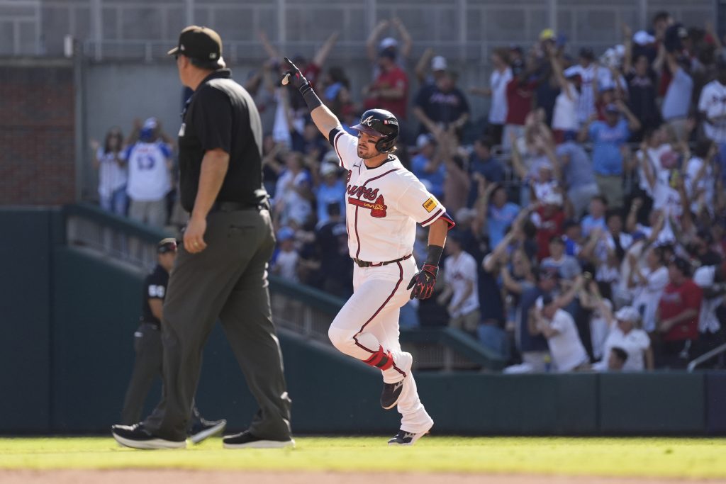 Sep 29, 2026; Cumberland, Georgia, USA; Atlanta Braves third baseman Austin Riley (27) reacts after hitting a three run home run against the Philadelphia Phillies in the eighth inning during game one of the Wildcard round for the 2026 MLB Playoffs at Truist Park.