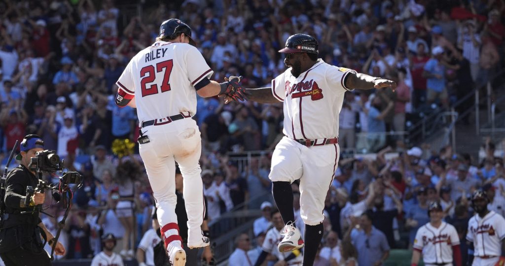 Sep 29, 2026; Cumberland, Georgia, USA; Atlanta Braves third baseman Austin Riley (27) reacts after hitting a three run home run against the Philadelphia Phillies in the eighth inning during game one of the Wildcard round for the 2026 MLB Playoffs at Truist Park.