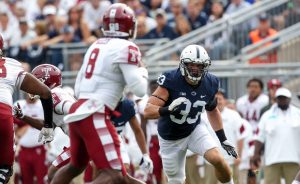 Sep 17, 2016; University Park, PA, USA; Penn State Nittany Lions linebacker Jake Cooper (33) looks to pressure Temple Owls quarterback Phillip Walker (8) during the fourth quarter at Beaver Stadium. Penn State defeated Temple 34-27.
