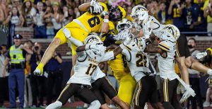 Michigan wide receiver JJ Buchanan (6) catches a 47-yard touchdown on a Hail Mary against Western Michigan to win, 13-12, as time expires in the fourth quarter at Michigan Stadium in Ann Arbor on Saturday, Sept. 5, 2026.