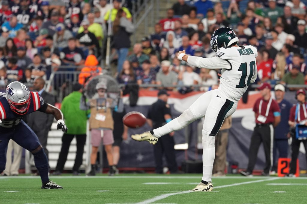 Aug 22, 2026; Foxborough, Massachusetts, USA; Philadelphia Eagles punter Braden Mann (10) punts the ball against the New England Patriots during the first half at Gillette Stadium.