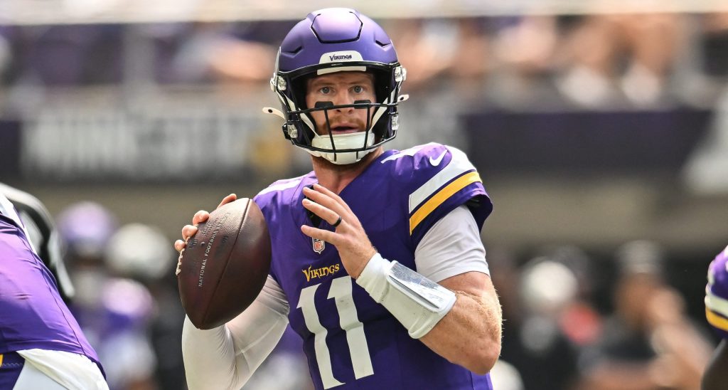 Aug 22, 2026; Minneapolis, Minnesota, USA; Minnesota Vikings quarterback Carson Wentz (11) looks to throws a pass against the Baltimore Ravens during the second quarter at U.S. Bank Stadium.