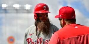 May 3, 2023; Los Angeles, California, USA; Philadelphia Phillies center fielder Brandon Marsh (16) speaks with hitting coach Kevin Long (53) before hitting against the Los Angeles Dodgers. during the eighth inning at Dodger Stadium.