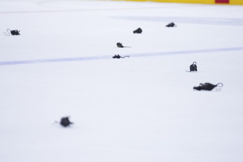 Apr 28, 2025; Sunrise, Florida, USA; Rubber rats l;ie on the ice after the Florida Panthers deafted the Tampa Bay Lightning in game four of the first round of the 2025 Stanley Cup Playoffs at Amerant Bank Arena. Mandatory Credit:
