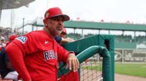 Feb 22, 2026; Fort Myers, Florida, USA; Boston Red Sox manager Alex Cora (13) looks on during the first